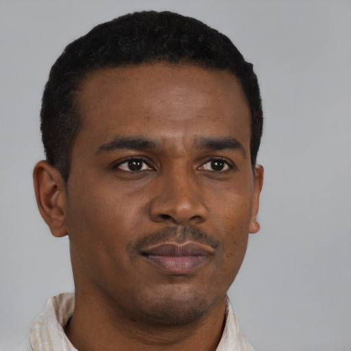 Neutral black young-adult male with short  brown hair and brown eyes