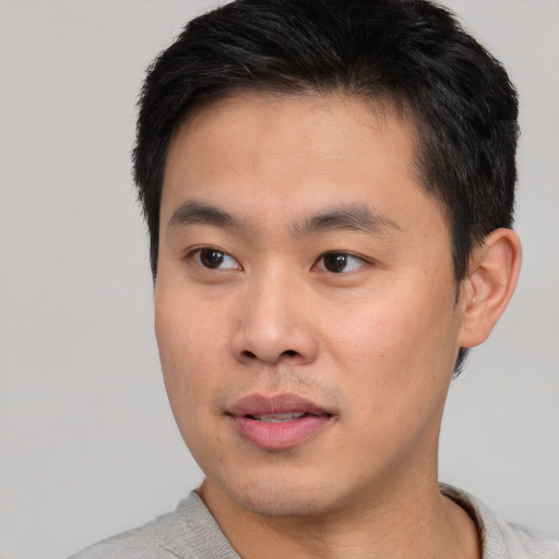 Neutral asian young-adult male with short  brown hair and brown eyes