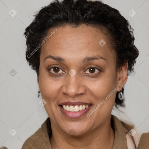 Joyful latino adult female with short  brown hair and brown eyes