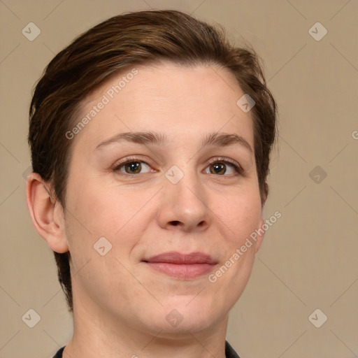 Joyful white adult female with short  brown hair and grey eyes