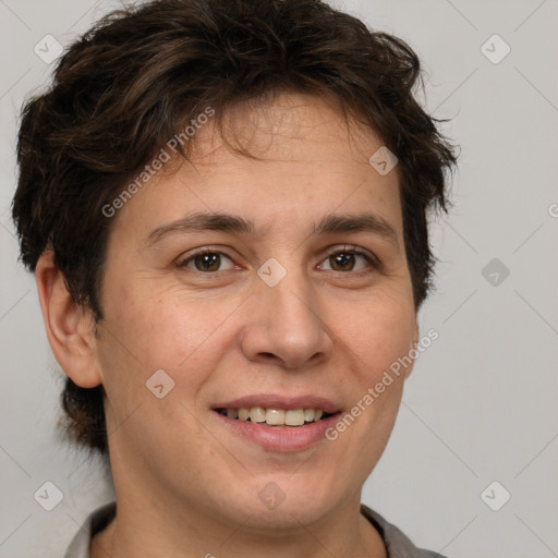 Joyful white adult female with short  brown hair and brown eyes