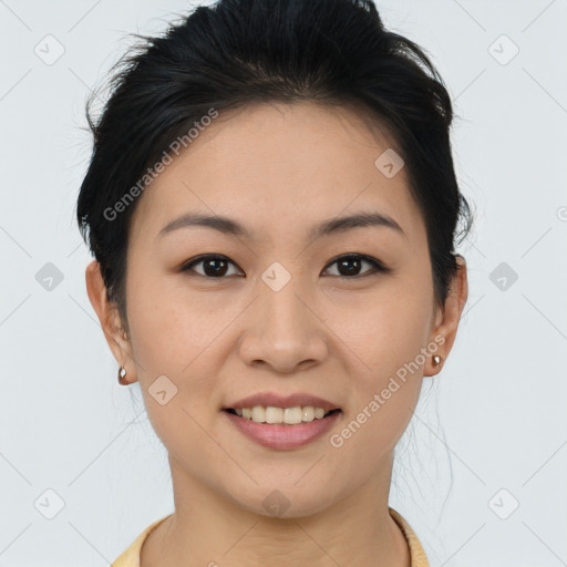 Joyful asian young-adult female with short  brown hair and brown eyes