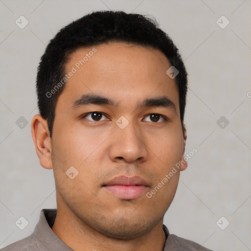 Neutral latino young-adult male with short  black hair and brown eyes