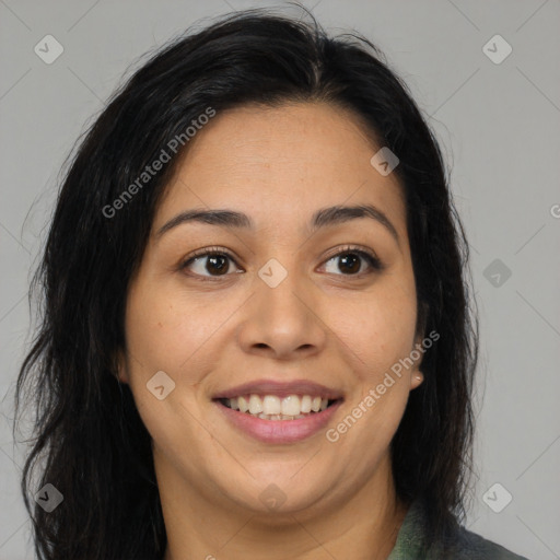 Joyful latino young-adult female with medium  brown hair and brown eyes