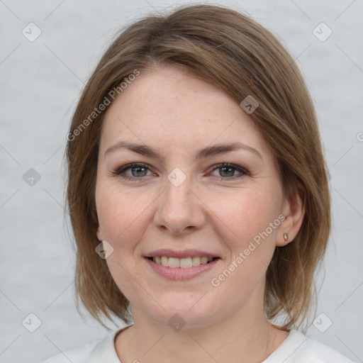 Joyful white young-adult female with medium  brown hair and grey eyes