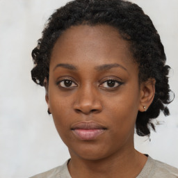 Neutral black young-adult female with short  black hair and brown eyes