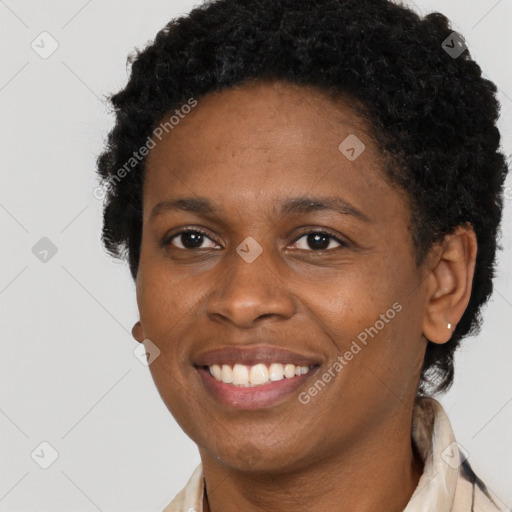 Joyful black young-adult female with short  brown hair and brown eyes