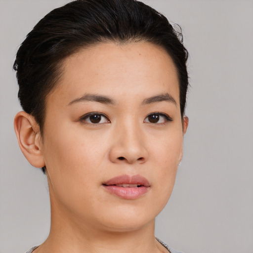 Neutral white young-adult female with short  brown hair and brown eyes