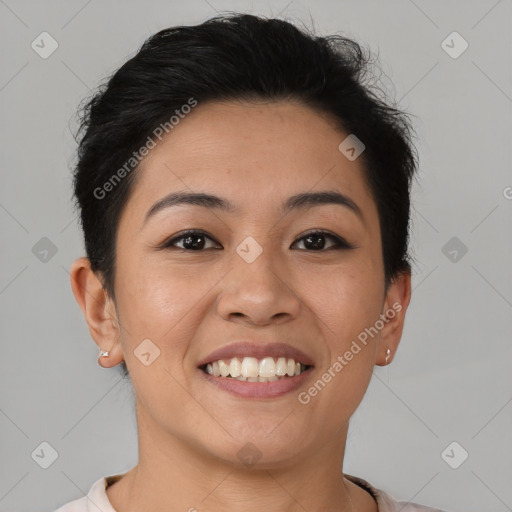 Joyful latino young-adult female with short  brown hair and brown eyes