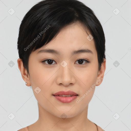 Joyful asian young-adult female with short  black hair and brown eyes