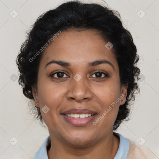 Joyful latino adult female with short  brown hair and brown eyes