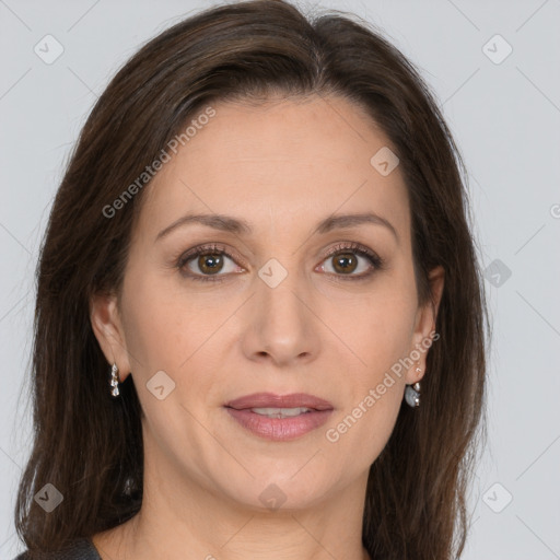 Joyful white adult female with medium  brown hair and grey eyes