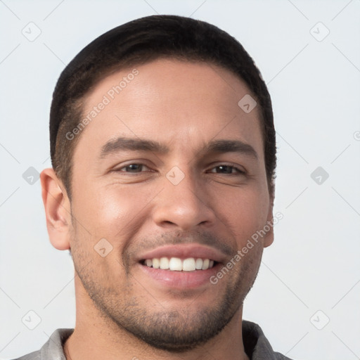 Joyful white young-adult male with short  brown hair and brown eyes