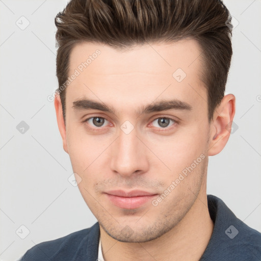 Neutral white young-adult male with short  brown hair and brown eyes