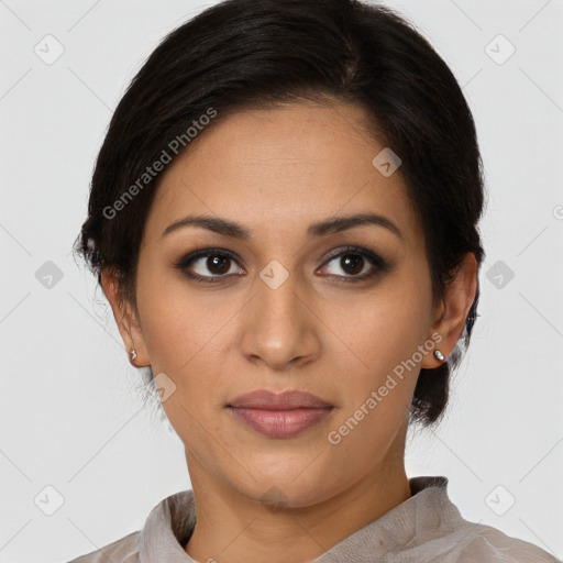 Joyful latino young-adult female with short  brown hair and brown eyes