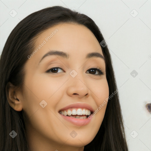 Joyful latino young-adult female with long  brown hair and brown eyes