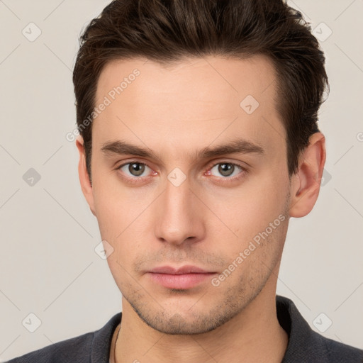 Neutral white young-adult male with short  brown hair and brown eyes