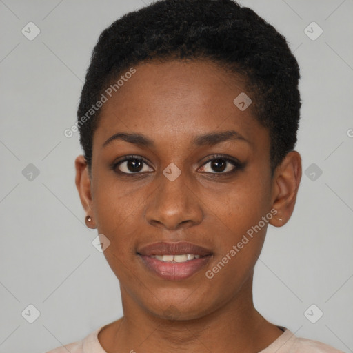 Joyful black young-adult female with short  black hair and brown eyes