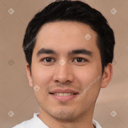 Joyful white young-adult male with short  black hair and brown eyes