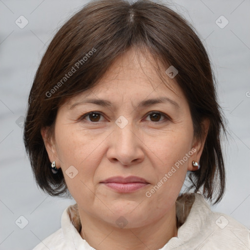 Joyful white adult female with medium  brown hair and brown eyes