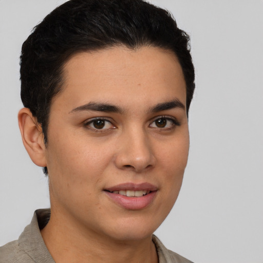 Joyful white young-adult female with short  brown hair and brown eyes