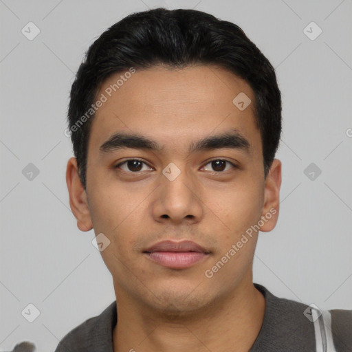 Neutral latino young-adult male with short  black hair and brown eyes