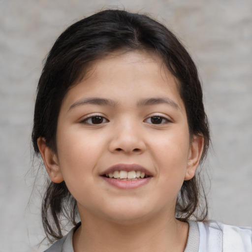 Joyful white child female with medium  brown hair and brown eyes