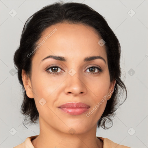 Joyful latino young-adult female with medium  brown hair and brown eyes