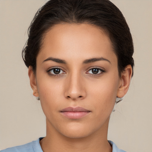 Neutral white young-adult female with medium  brown hair and brown eyes