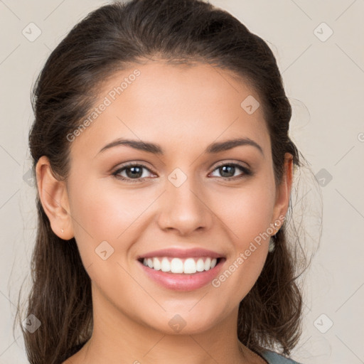 Joyful white young-adult female with medium  brown hair and brown eyes