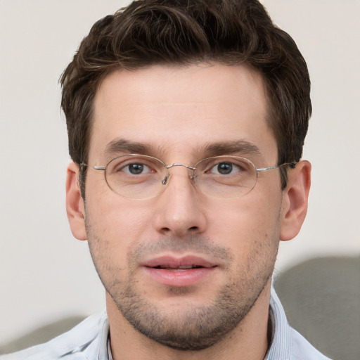 Neutral white young-adult male with short  brown hair and grey eyes