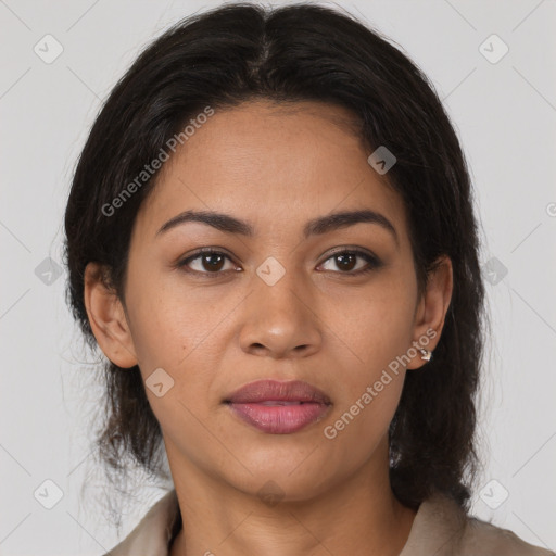 Joyful latino young-adult female with medium  brown hair and brown eyes