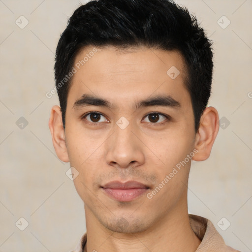 Neutral latino young-adult male with short  black hair and brown eyes