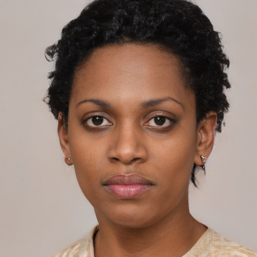 Neutral black young-adult female with short  black hair and brown eyes