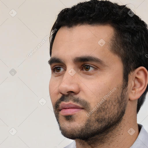 Neutral white young-adult male with short  black hair and brown eyes