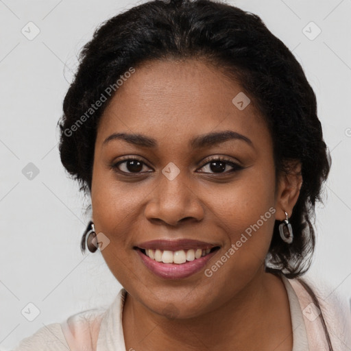 Joyful black young-adult female with medium  brown hair and brown eyes