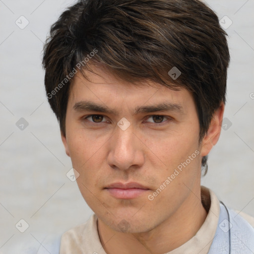 Neutral white young-adult male with short  brown hair and brown eyes