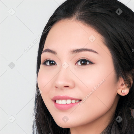 Joyful white young-adult female with long  black hair and brown eyes