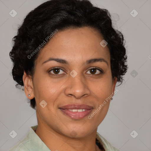 Joyful latino adult female with short  brown hair and brown eyes