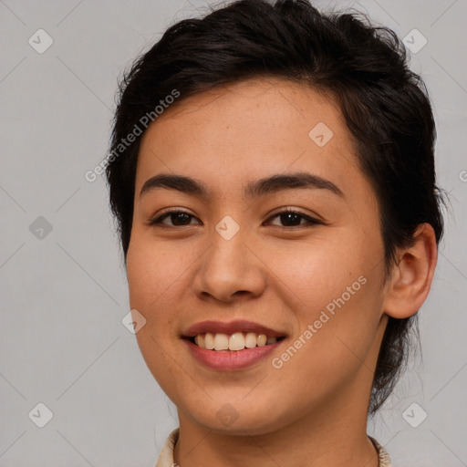 Joyful asian young-adult female with medium  brown hair and brown eyes