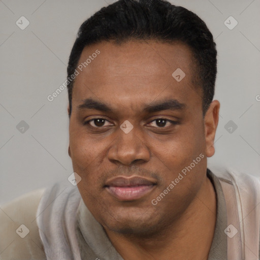 Joyful black young-adult male with short  black hair and brown eyes