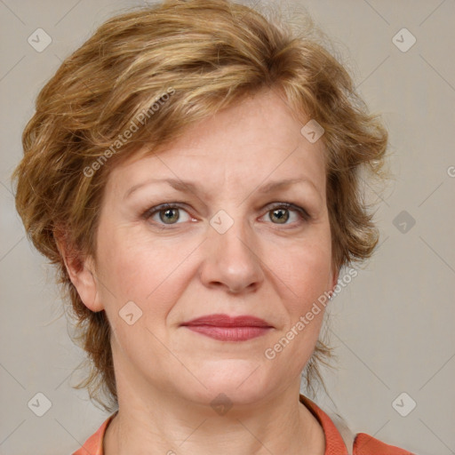 Joyful white adult female with medium  brown hair and blue eyes