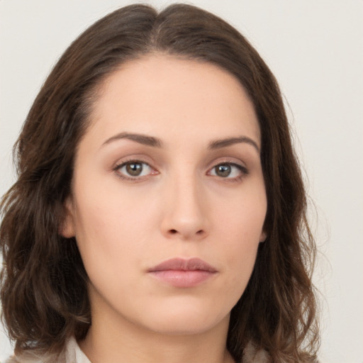 Neutral white young-adult female with medium  brown hair and brown eyes