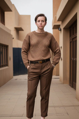 Malian adult non-binary with  brown hair