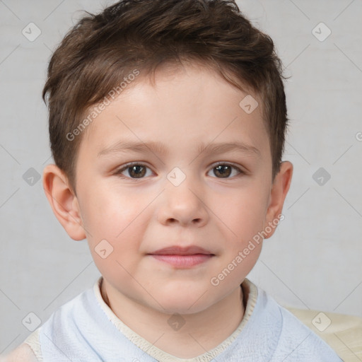 Joyful white child male with short  brown hair and brown eyes