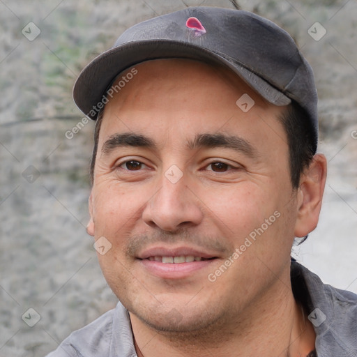 Joyful white young-adult male with short  black hair and brown eyes