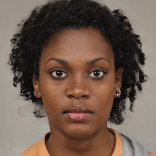 Neutral black young-adult female with short  black hair and brown eyes