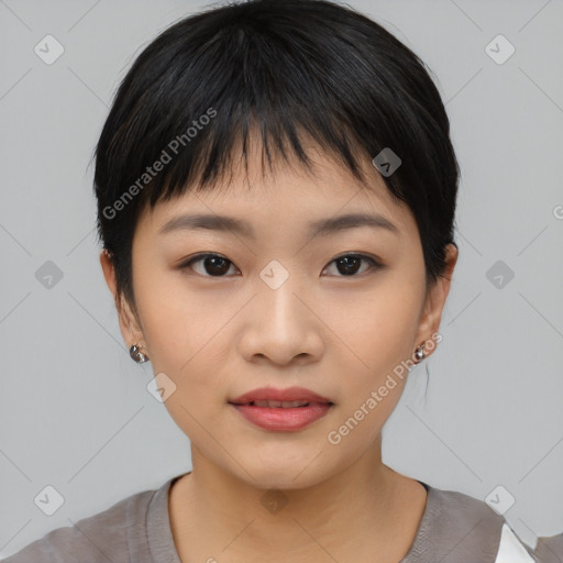 Joyful asian young-adult female with short  black hair and brown eyes