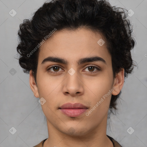 Joyful latino young-adult male with short  brown hair and brown eyes