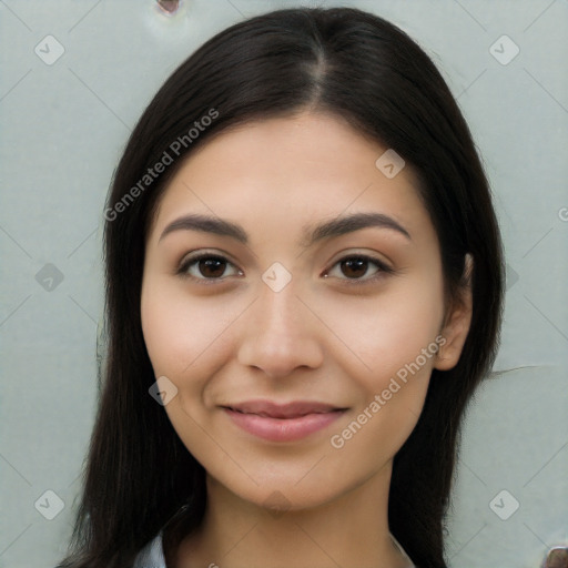 Joyful latino young-adult female with long  brown hair and brown eyes